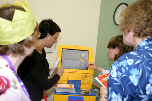 Demonstrating how the kiosk works