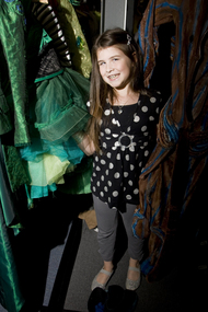 Kate Law amongst the costumes backstage at Wicked