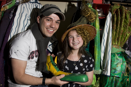 Anthony Callea and Kate Law amongst the costumes backstage at Wicked