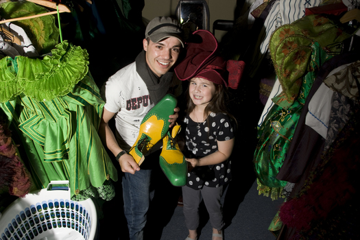 Anthony Callea and Kate Law amongst the costumes backstage at Wicked