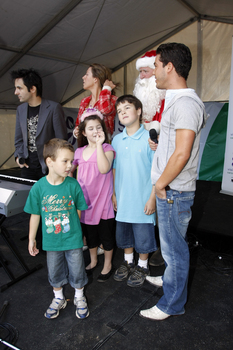 Carols launch: John Foreman, the Law family, Anthony Callea and Santa