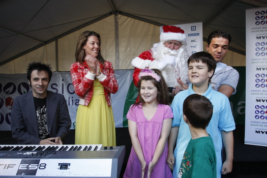 Carols launch: John Foreman, the Law family, Anthony Callea and Santa