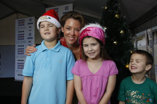 Carols launch: Nicholas, Kate and Jacob Law with ?