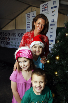 Carols launch: Nicholas, Kate and Jacob Law with ?