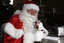 Carols launch: Santa having a warm drink from Brunetti