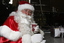 Carols launch: Santa having a warm drink from Brunetti