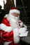 Carols launch: Santa having a warm drink from Brunetti