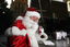 Carols launch: Santa having a warm drink from Brunetti