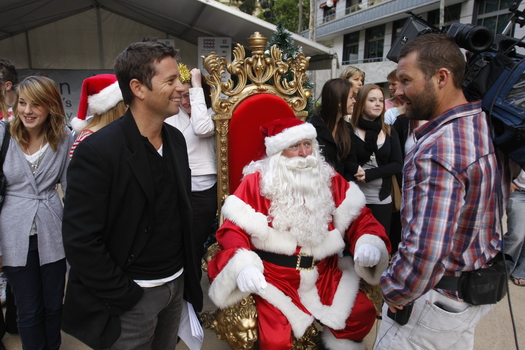 Carols launch: Steve Jacobs, Santa and the audience filmed by Channel 9 cameraman