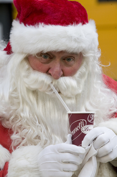 Carols launch: Santa with a warm drink from Brunetti