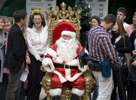 Carols launch: Steve Jacobs with Santa and audience