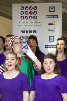 Carols launch: Australian Girls Choir performing with Entertainment Shop elves