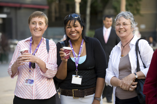 Carols launch: Marg Harvey and two women