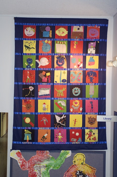 Felt pictures attached to a cloth frame