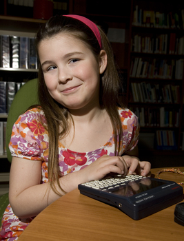 Kate Law using a Franklin Language Master dictionary