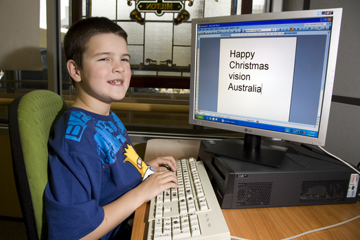 Nicholas Law using a computer in the Browsing Library