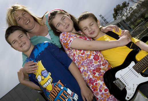 Nicholas, Jayne, Jacob and Kate Law outside at Kooyong