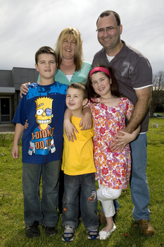 Nicholas, Jayne, Jacob, David and Kate Law outside at Kooyong