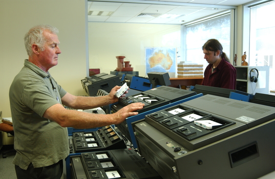 Ted Johnson and Justin Bates operate the machines