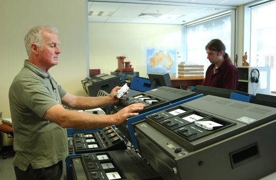 Ted Johnson and Justin Bates operate the machines