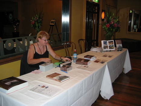 Table at front with books ready for signing and purchase