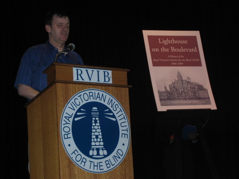 Steven Herd at the podium