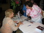 Judith Buckrich signing copies of Lighthouse on the Boulevard