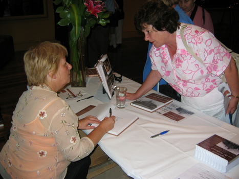 Judith Buckrich signing copies of Lighthouse on the Boulevard