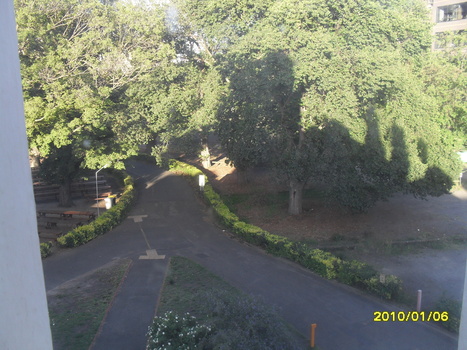 Looking down towards main driveway from upper floor of building