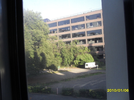Looking down towards St Kilda Road neighbour from upper floor of building