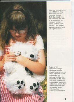 Young girl Emily Macdonald holds a soft toy dog as she checks her watch