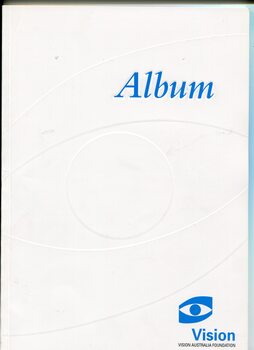 Embossed VAF eye logo on white cover