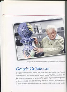 Profile of client Georgie Gribble in Shepparton touching an artwork