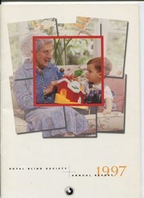 Older female and young boy on a couch with a toy farmhouse