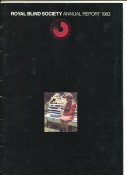Black cover with colour photo of woman on bench