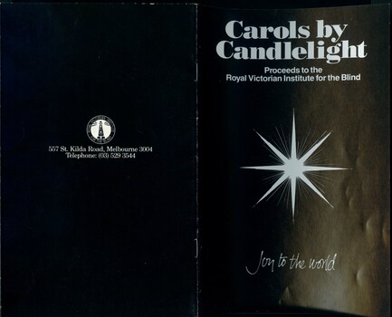 Black cover with white writing and star