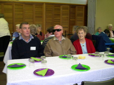 Three people sitting at table from Echuca