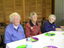 Three people sitting at table from Echuca