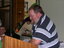 Ken Jones speaking from the podium