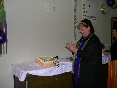 Sharon with the cake after cutting