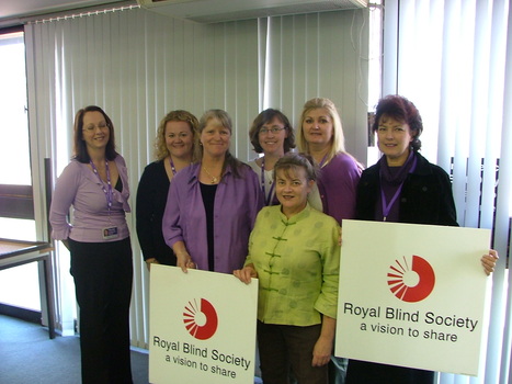 Staff at branch launch party for Vision Australia