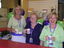 ?, Debbie O'Sullivan and Lyn Curtis in equipment shop on Brand Launch day