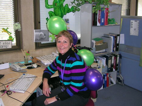 Kathy Fela at her desk on brand launch day