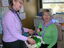 Denise Pellow at her desk on brand launch day