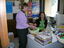 Staff member at her desk on brand launch day