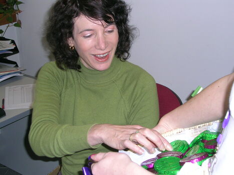 Jane Lander at her desk on branch launch day