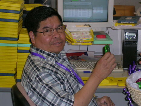 Tony Hernandez at his desk on branch launch day