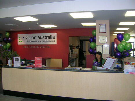 Reception area with new logo and decorations for brand launch