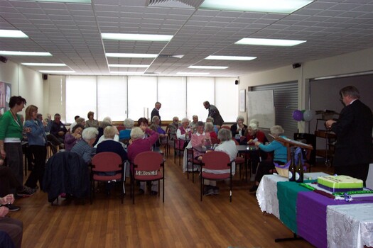 Staff and Day Centre clients at branch launch party for Vision Australia