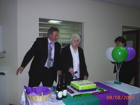 Brian Hardy and Daisy Stepnell cut the cake